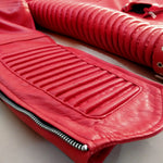 close look of red rope padded leather jacket sleeves