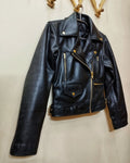 wall hanging golden accessories leather jacket